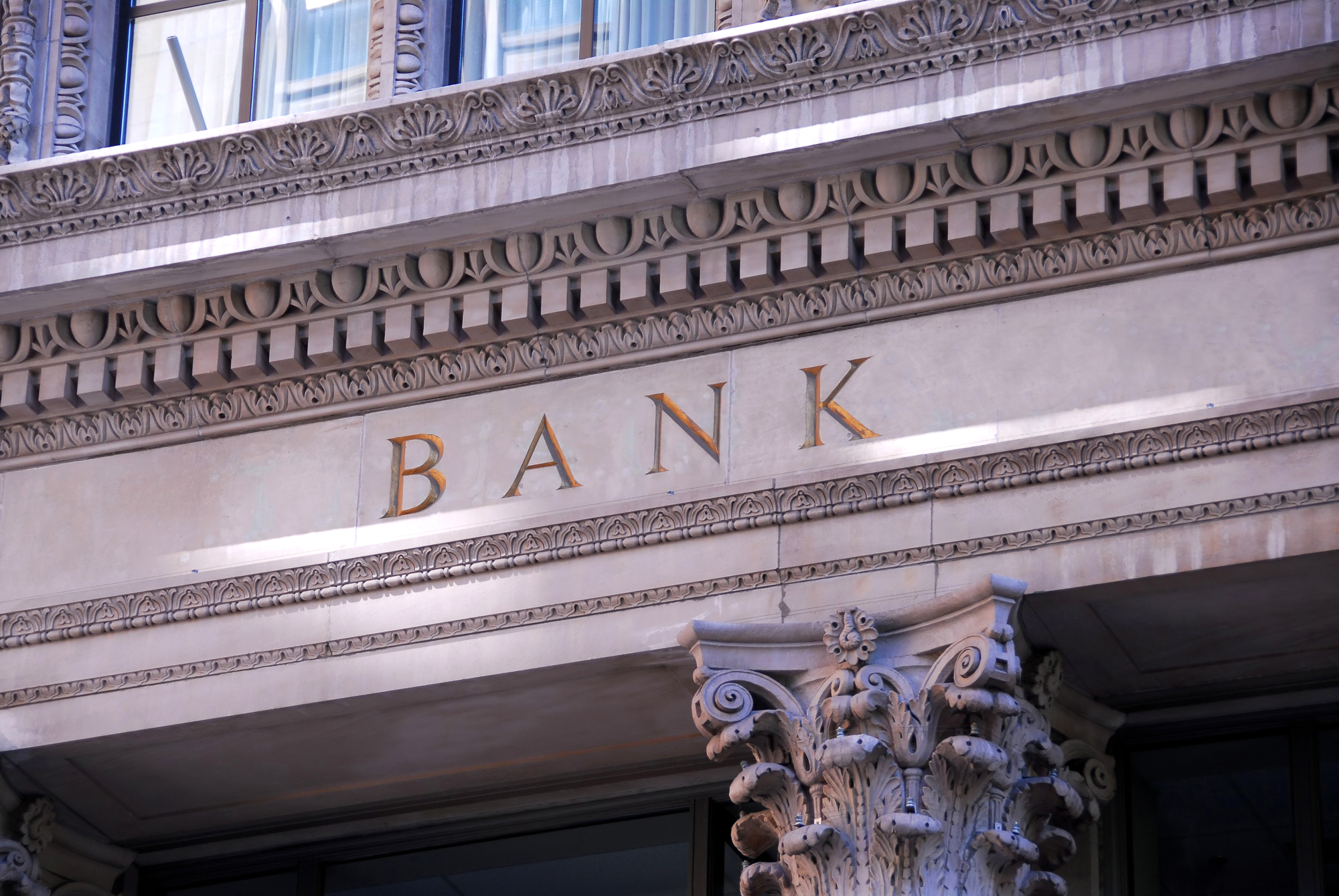 Façade of a stone bank building.