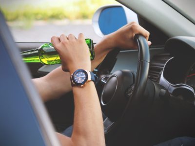 Man drinking an open container of alcohol in Illinois